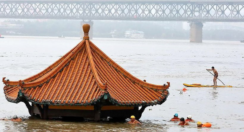 A recovering China faces worst floods in decades