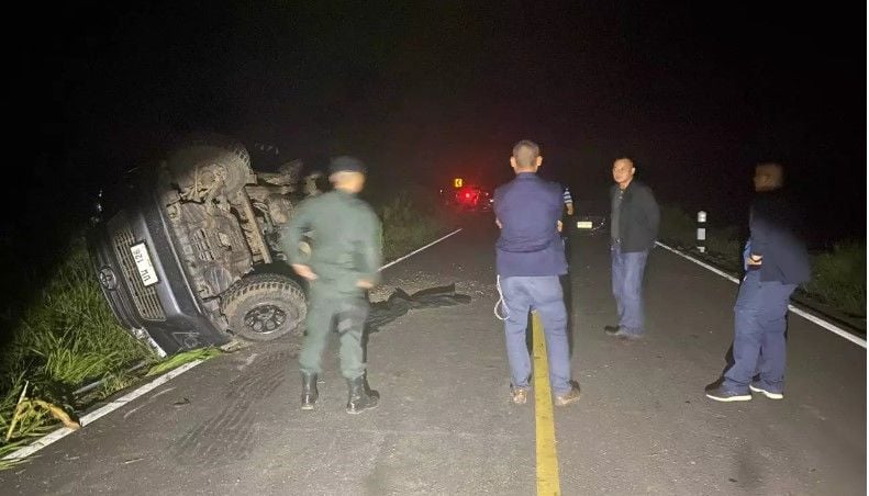 Truck flips after police chase near the Myanmar border