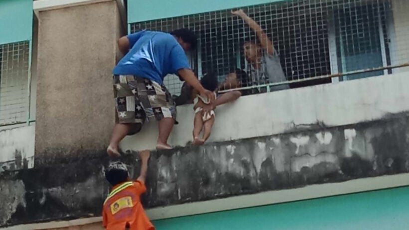 Bangkok motorbike taxi driver rescues 2 year old from ledge