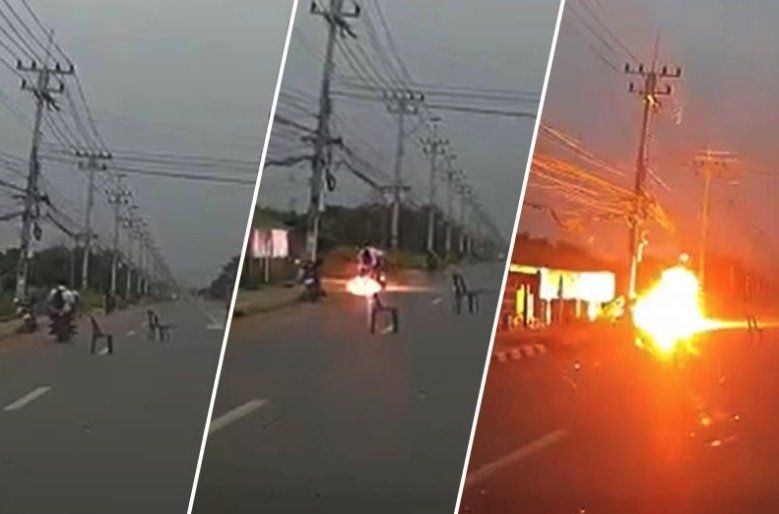 Loose electrical wire causes passing motorbike to burst into flames – VIDEO