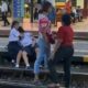 Woman faces charges after allegedly slapping a student for not standing during national anthem | The Thaiger