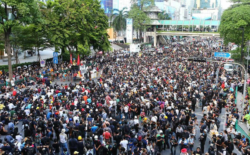 Man wearing pink raincoat wanted on suspicion of firing shots at Bangkok rally