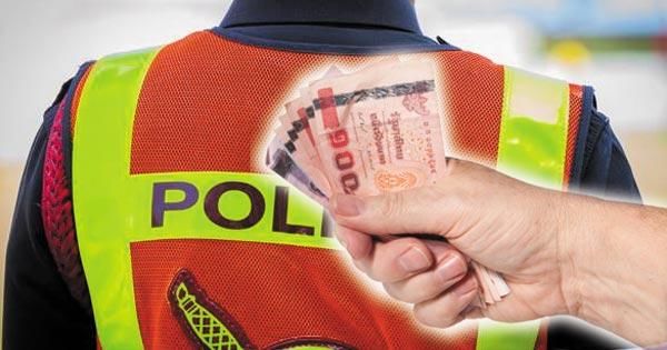 Police allegedly caught taking a bribe, officers told to “behave appropriately”