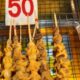 Venomous octopus grilled and up for sale at Pathum Thani market | The Thaiger