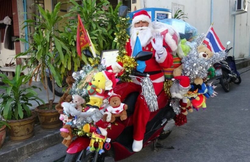 “Santa Claus of Rayong” rides motorbike through Northern Thailand