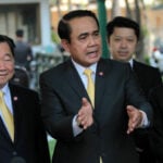 Opposition calls for the Thai PM to stand down, Democrats re-iterate their support | Thaiger