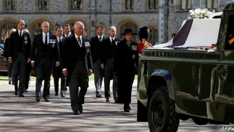 The Queen sits as a lonely figure as she bids farewell to her husband Prince Philip