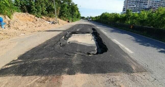 Pattaya residents complain of sinkholes in road, couple sustains injuries