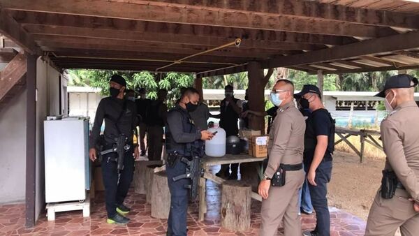 Krabi man allegedly fires gun at quarantine hotel, flees with wife and son