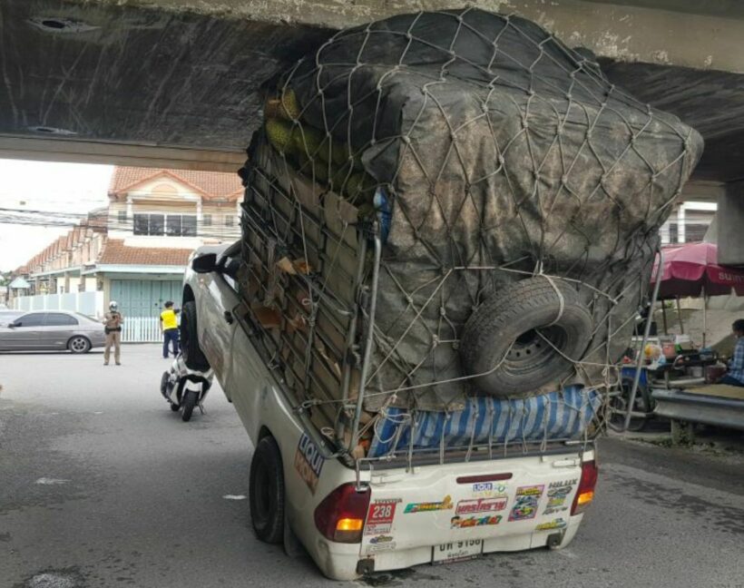 Driver blames GPS for durian truck wedged under overpass