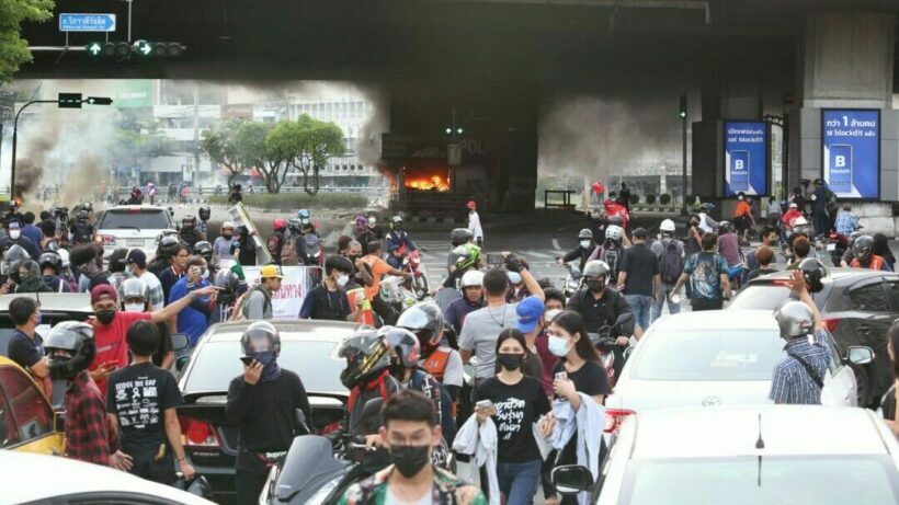 Bangkok police arrest 12 year old and others at Din Daeng intersection for violating curfew