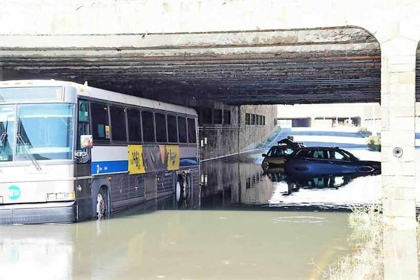 Shocked New Yorkers survey the damage following torrential rainfall