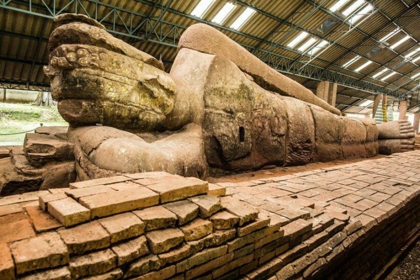 Thailand’s oldest reclining Buddha partially submerged in flood waters