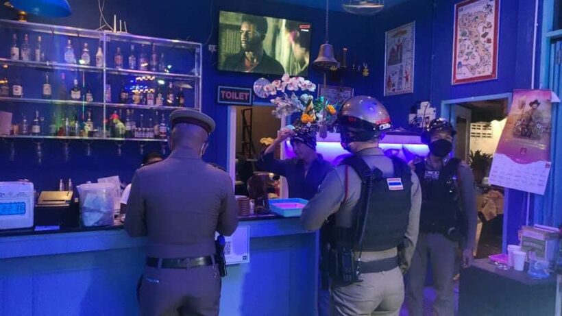 Police raid Pattaya beach bar and arrest 30 customers