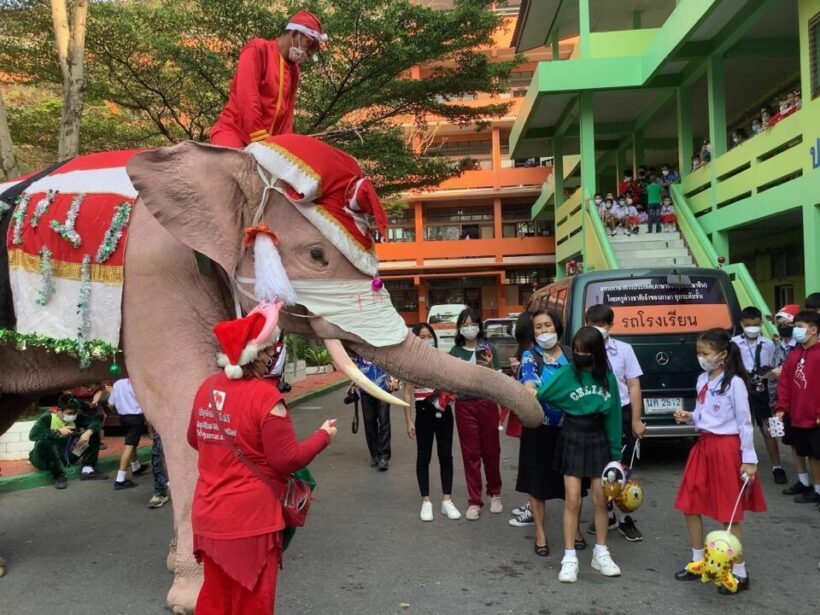 Christmas in Thailand… Santa travels by motorbike and elephants give gifts