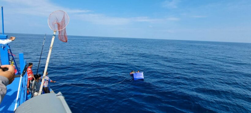 Three fishermen found clinging to a foam crate in the middle of the sea