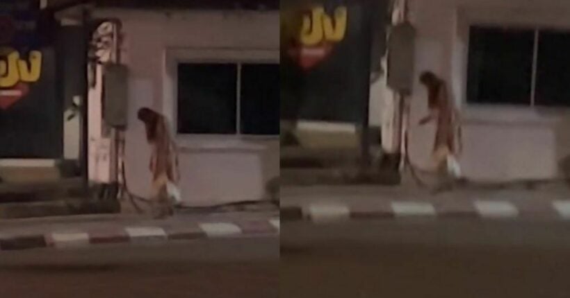 Thai netizens share video of mysterious woman standing still on Pattaya sidewalk for hours