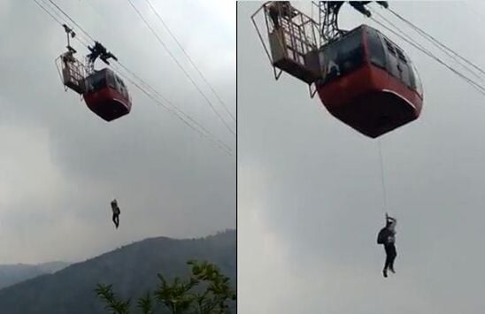 Tourists stuck in cable car for hours climb down by rope in India