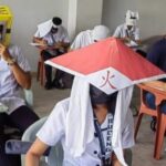 Silly anti-cheating masks in university go viral | Thaiger