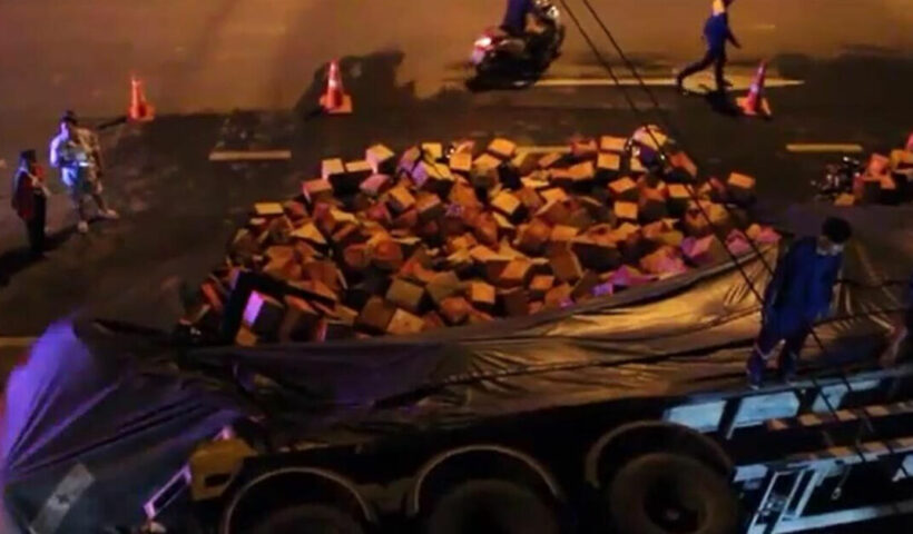 Truck overturns carrying 2,560 crates of beer in central Thailand