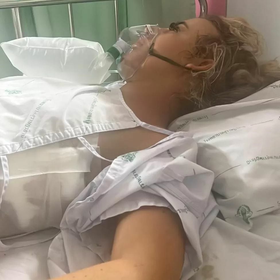 British woman who fell from KPN balcony goes home