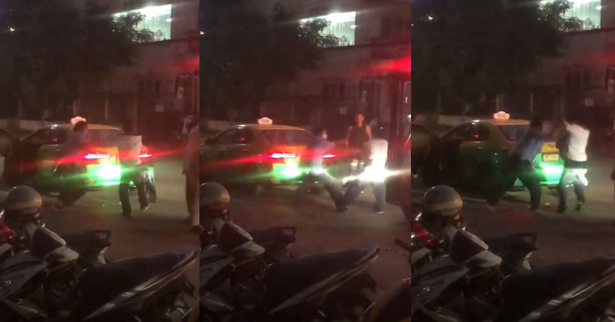 Bangkok taxi driver brawls with passenger in the street (video)