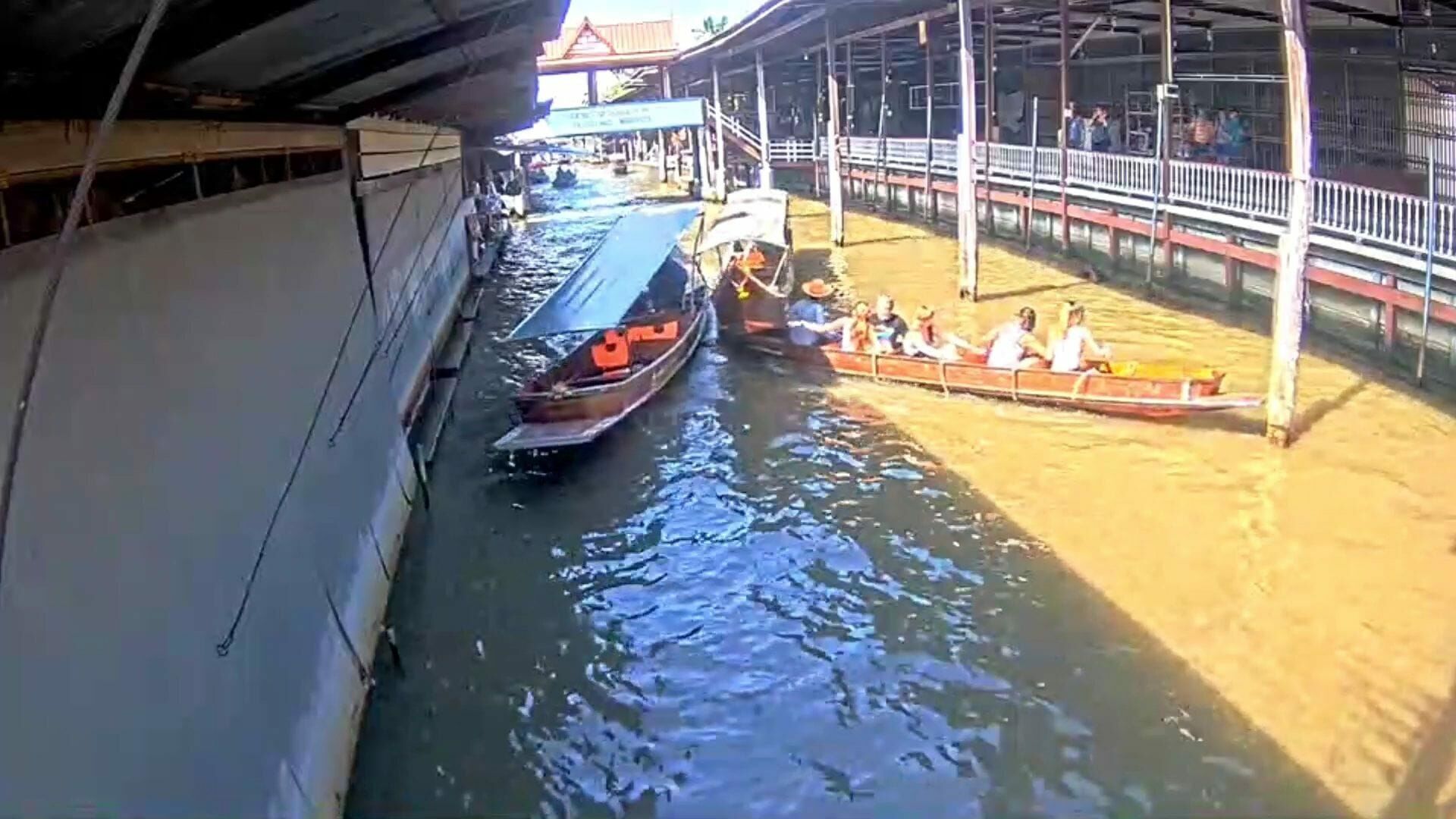 Racing longtail boats collide with Chinese tour boat