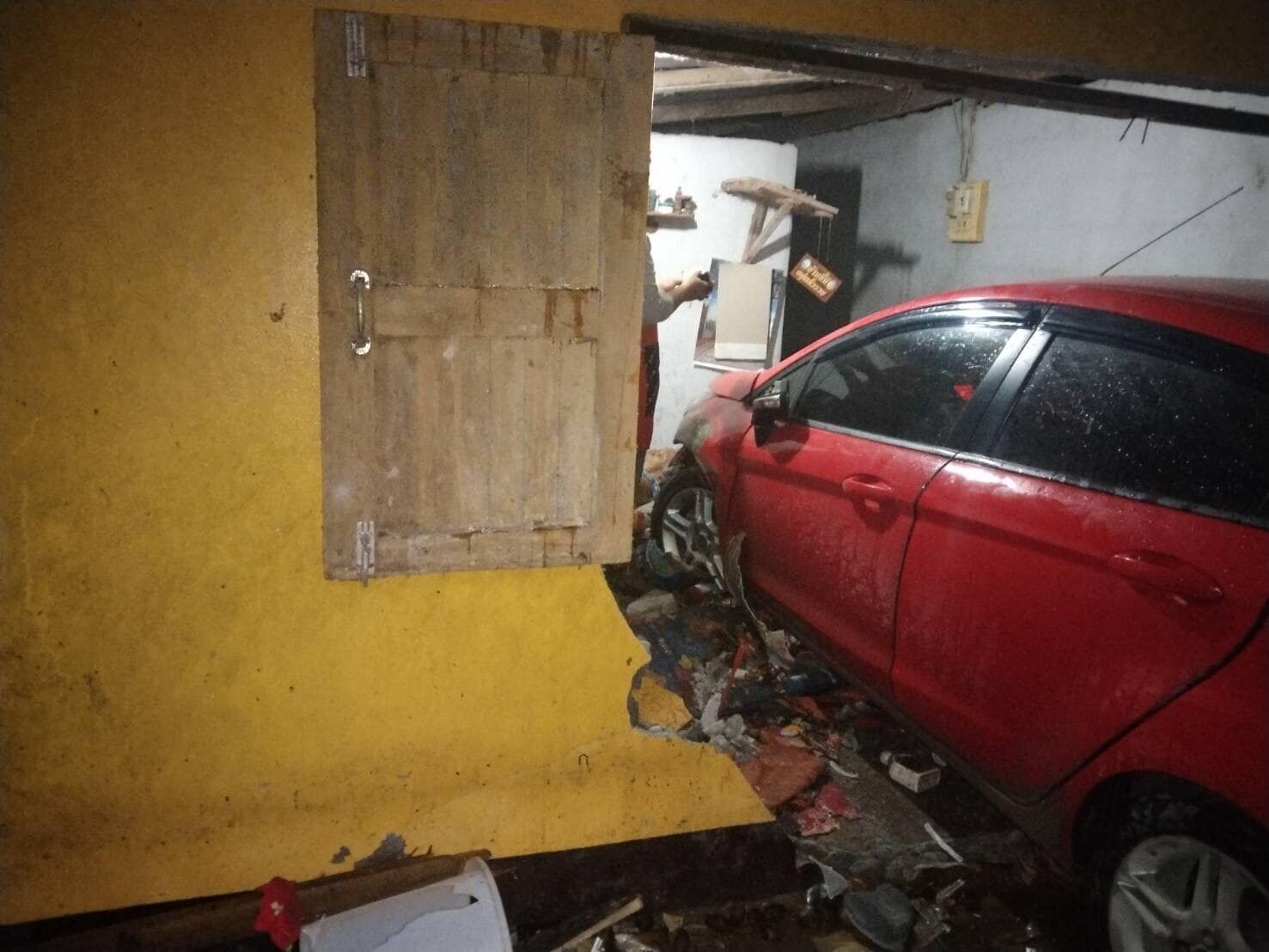 Old woman severely injured after drunk official crashes car into her house