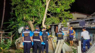 Man finds body with gunshot wound behind his house in central Thailand