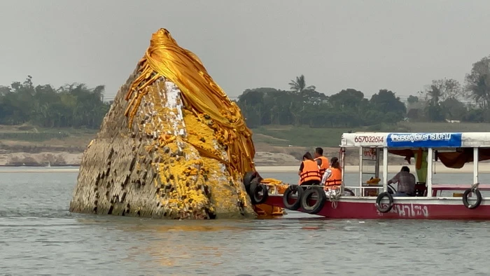 Ancient Buddhist stupa emerges from Mekong river in Thailand