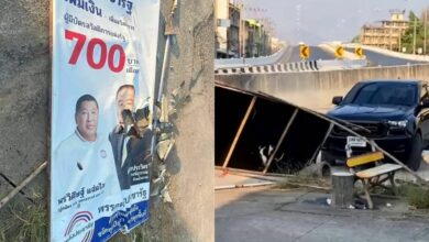 Angry Thai man crashes car into PPRP election poster