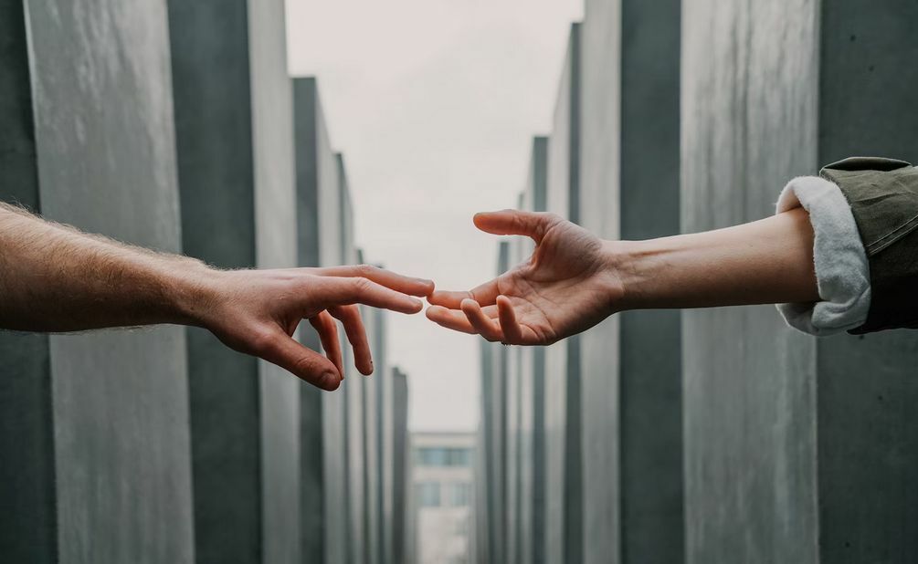 People touching each other hand