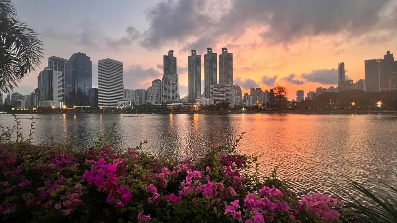 A view from Benjakitti Park when the sun is on the horizon; this is actually a sunrise in the picture