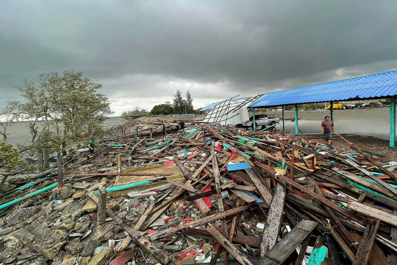 Summer storms cause chaos in coastal regions as boats overturn