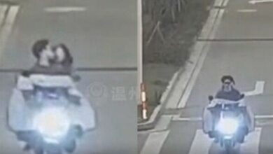Netizens show no sympathy for couple who crash after kissing on motorcycle (video)