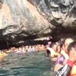 Stranded in paradise: Viral video shows 85 tourists trapped in water near Thai Cave | Thaiger