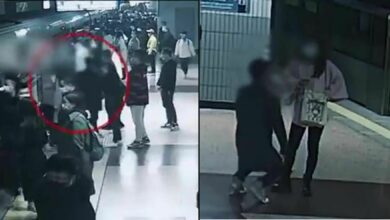 Beijing woman catches subway harasser, awaits police while holding him