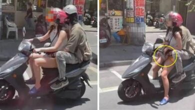 Taiwanese couple gropes on motorbike at traffic lights sparks outrage
