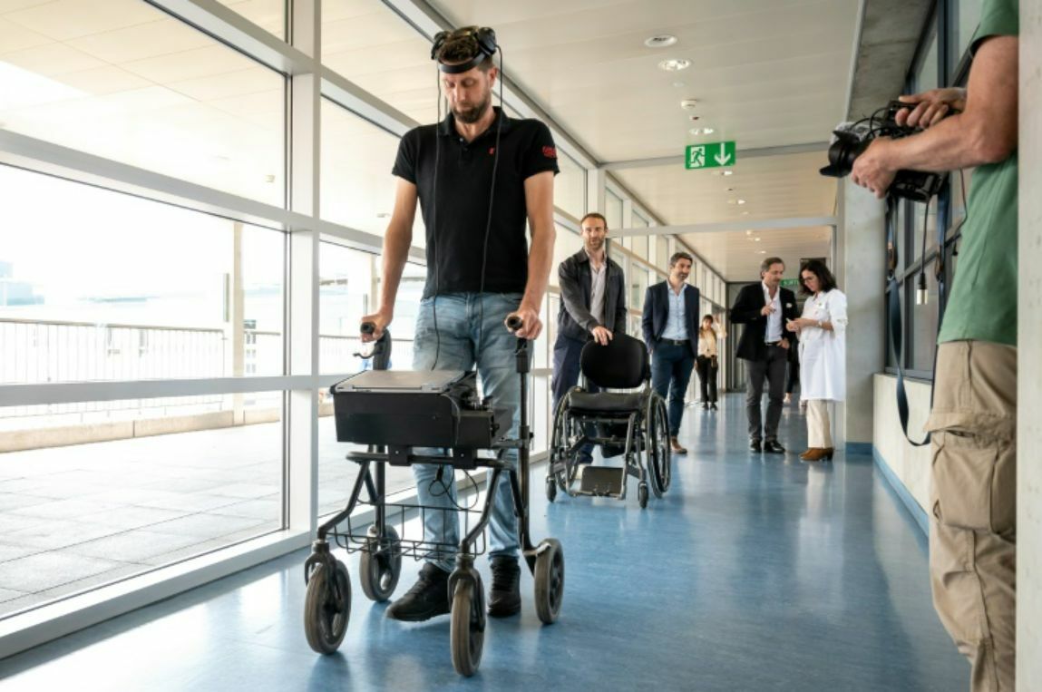 Paralysed man walks using thoughts with breakthrough brain-spinal cord implants