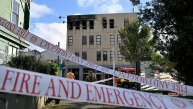 Man charged with murder over fatal Wellington hostel fire amid housing crisis