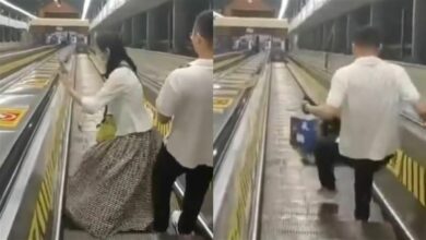 Woman tumbles down China’s longest escalator while posing for photos