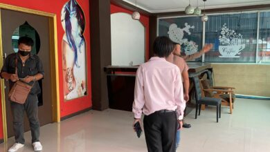 Indian squatters run bar and rent rooms in abandoned Pattaya building
