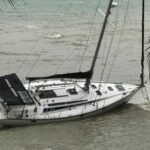 Phuket yacht sweeps ashore amid severe weather, safety warnings reiterated | Thaiger