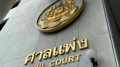 Thai court officer fined 500 baht and sentenced for charging journalist for parking