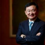 Awaiting arrest, ex-Prime Minister Thaksin returns to Thailand amidst political unrest | Thaiger