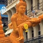 Korat Candle Procession 66 event upstaged by scene-stealing cat | Thaiger