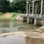 Heavy rainfall fills Phimai Dam to capacity, floodgates opened for irrigation | Thaiger