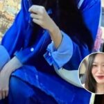 Ghost? Thai woman found herself with three arms in portrait taken at temple