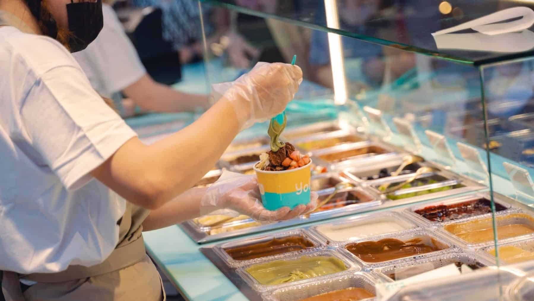 A man preparing vegan ice cream in Bangkok
