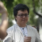 Thai activist Arnon Nampa sentenced to four years in prison for royal defamation | Thaiger